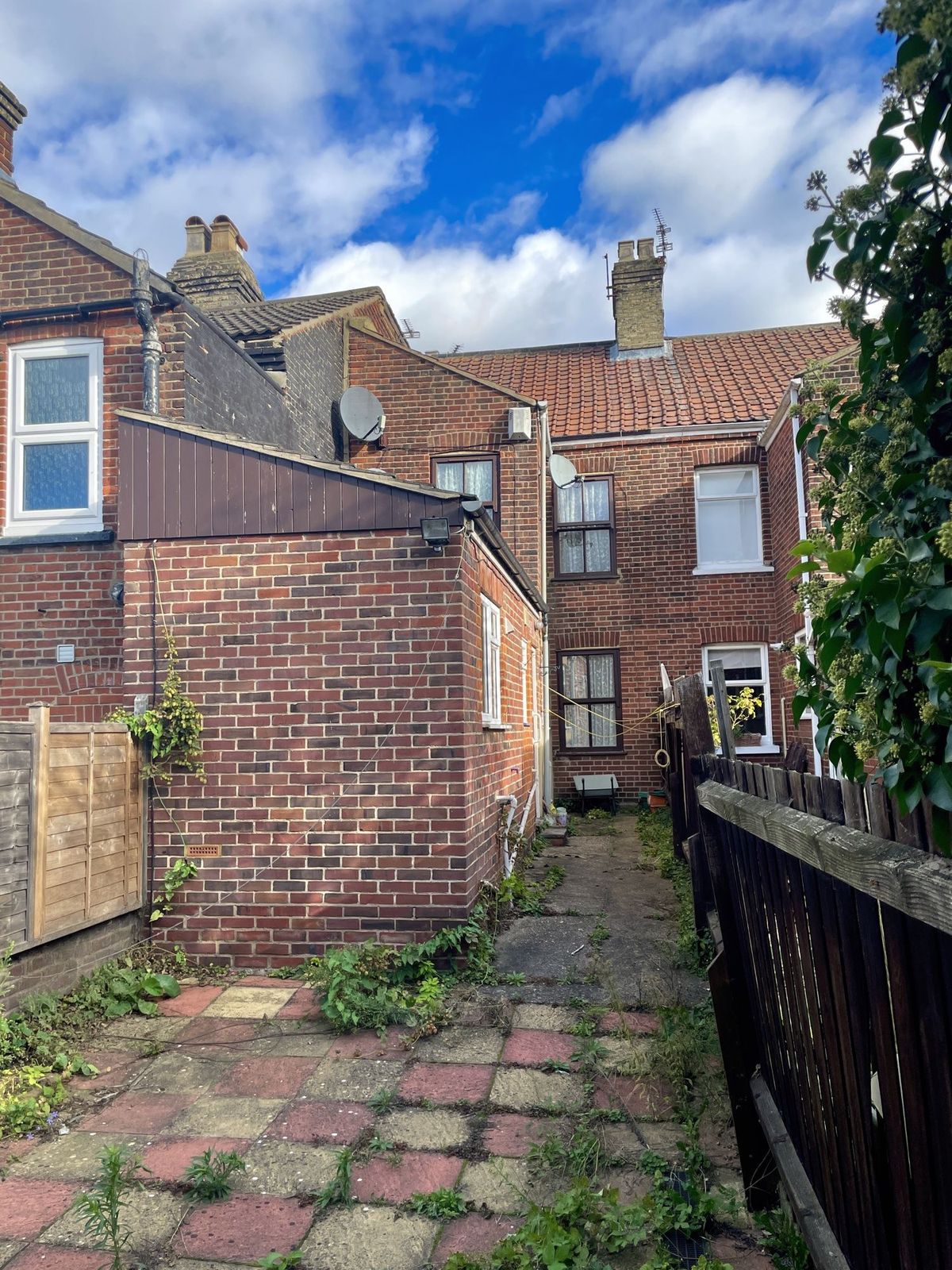Rear extension before rendering: bare red brick
